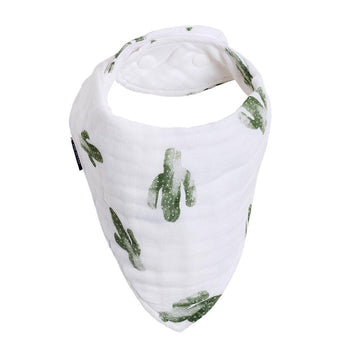 Picture of a triangular shaped muslin bib with two snaps at the neck. It has green saguaros on a white background