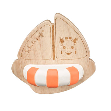 Picture of Sophie La Girafe boat bath toy, with wooden boat shape cutout with laser etched sails and sophie picture with a striped orange and white rubber disc forming the deck of the boat