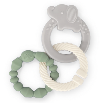 Three baby teething rings, one green with bead shapes, one gray with an elephant, and one white with a rope texture, on a white background.