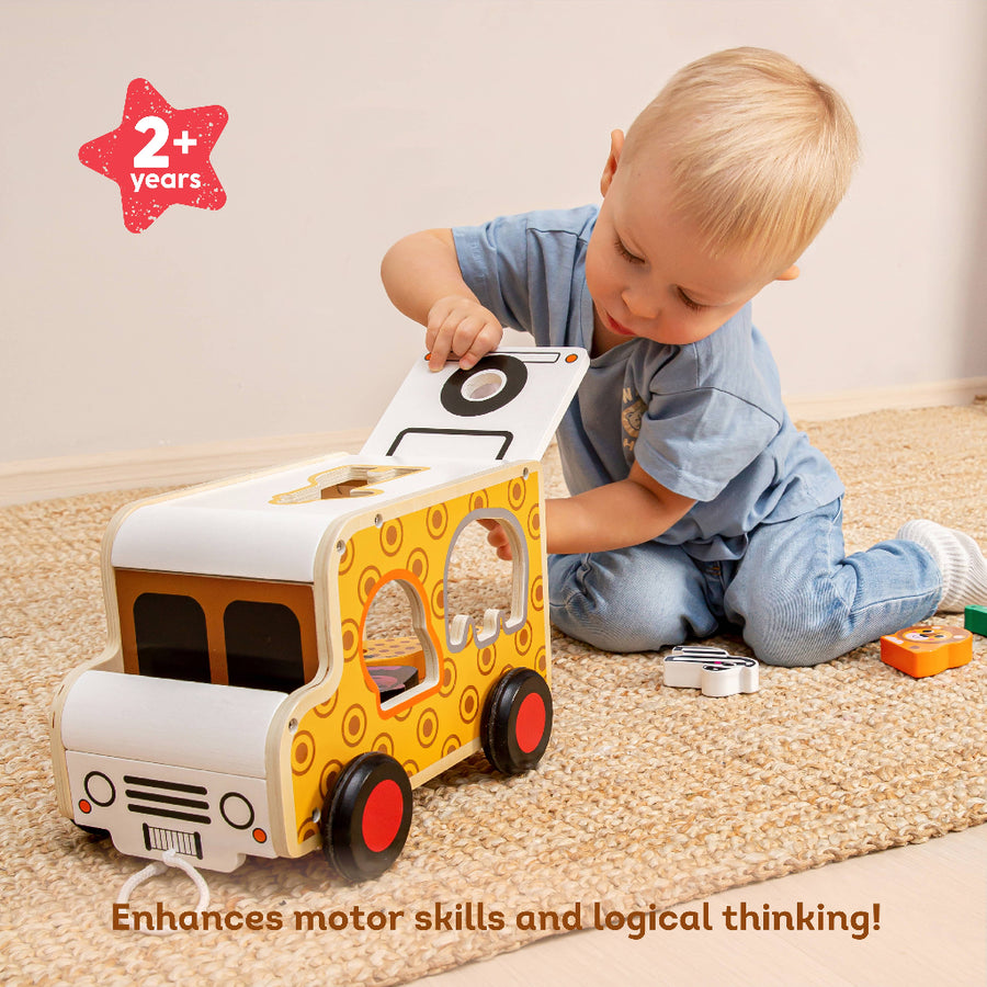 Child playing with a toy vehicle on a carpeted floor, with text indicating age suitability and benefits.