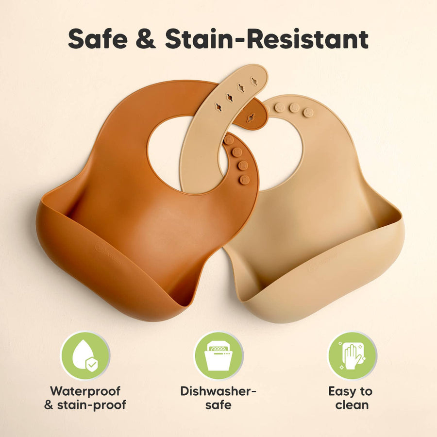 Two baby bibs in brown and beige with safety features highlighted on a beige background.