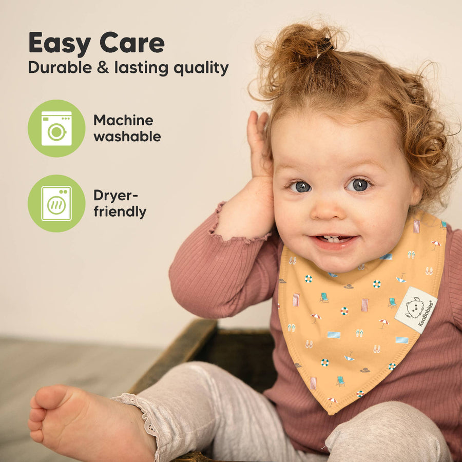 Child wearing a bib with text about easy care and washing instructions.