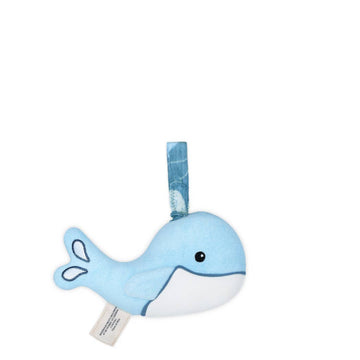 Blue whale-shaped plush toy with a white belly on a white background