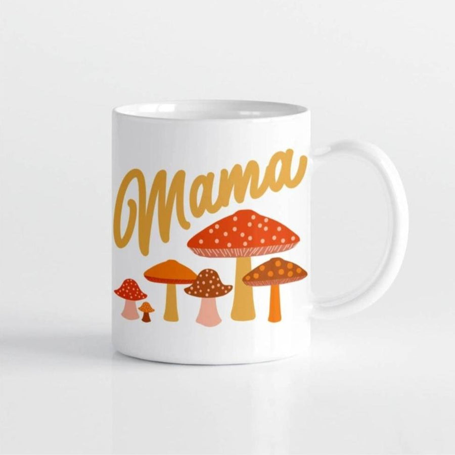 Picture of the mug against a white background. It has the word Mama in dark yellow cursive script, above a variety of toadstool type mushrooms in shades of red, yellow, orange, brown, and yellow