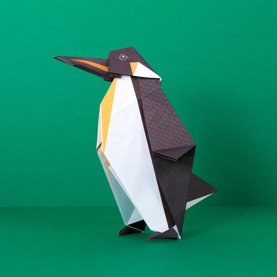 Image shows the assembled penguin against a green background