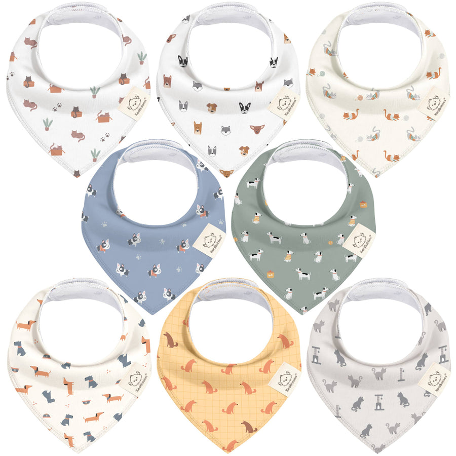 Set of eight baby bibs with various animal patterns on a white background