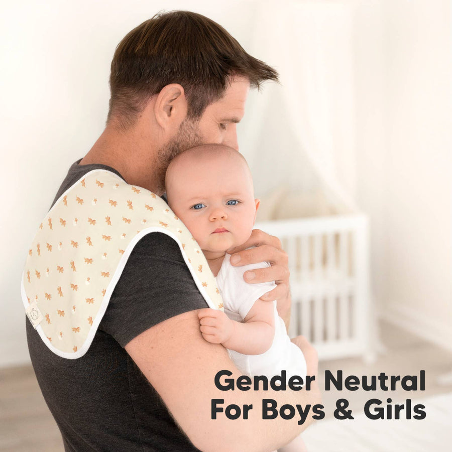 Man holding a baby with a bib, text 'Gender Neutral For Boys & Girls' on a blurred background