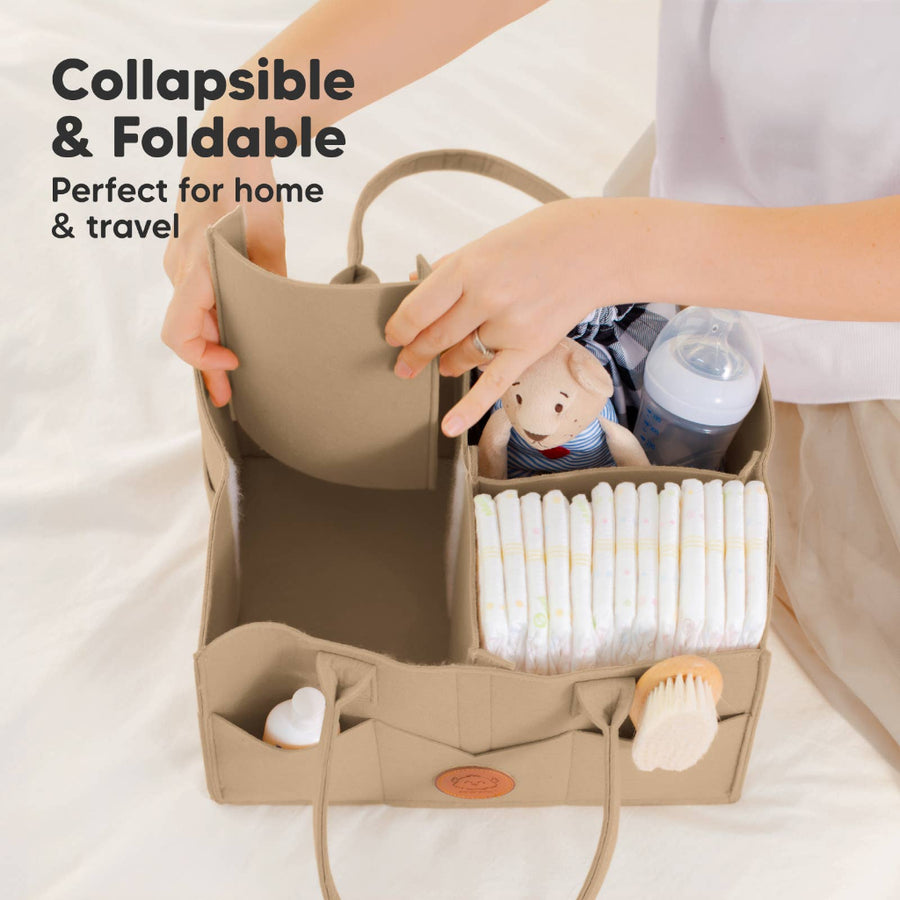 Collapsible and foldable bag with baby items on a white background