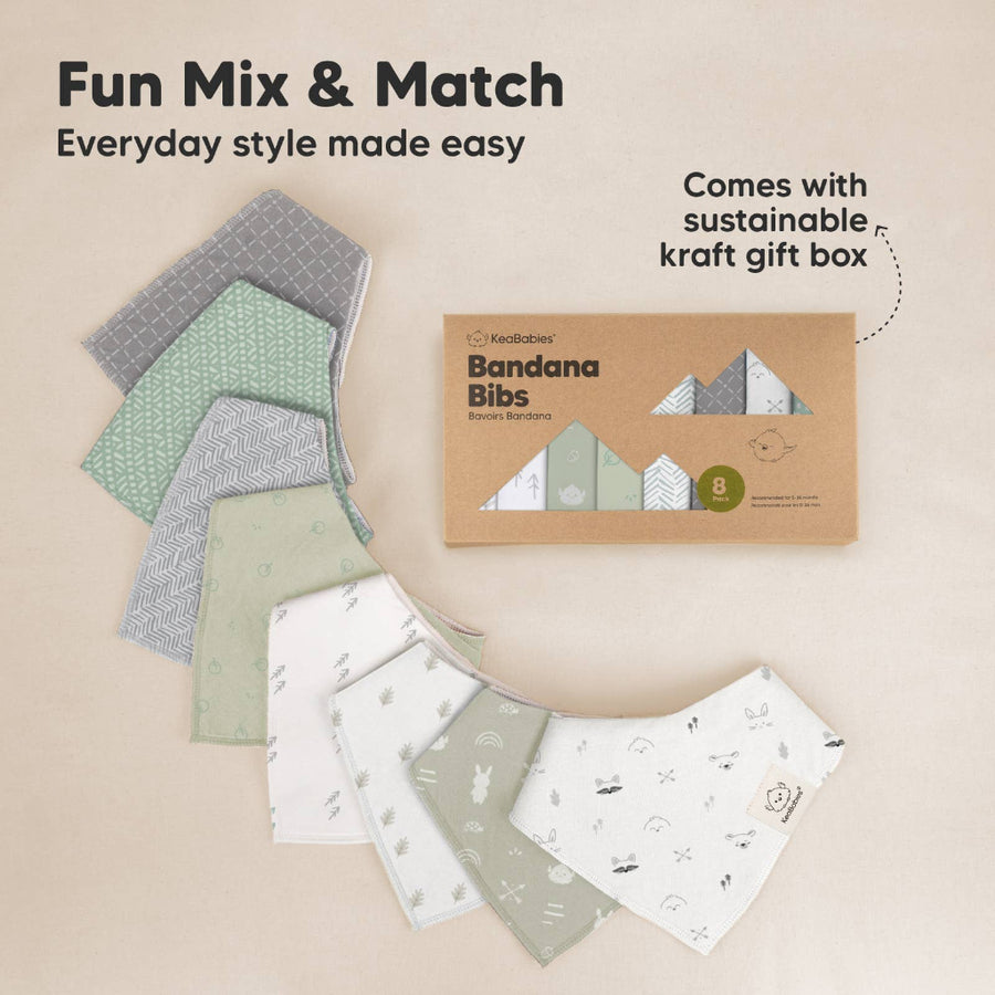 Set of bandana bibs with packaging on a beige background