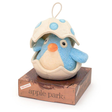 Blue plush bird inside a hatching egg, on a box with a nest picture that says Apple Park