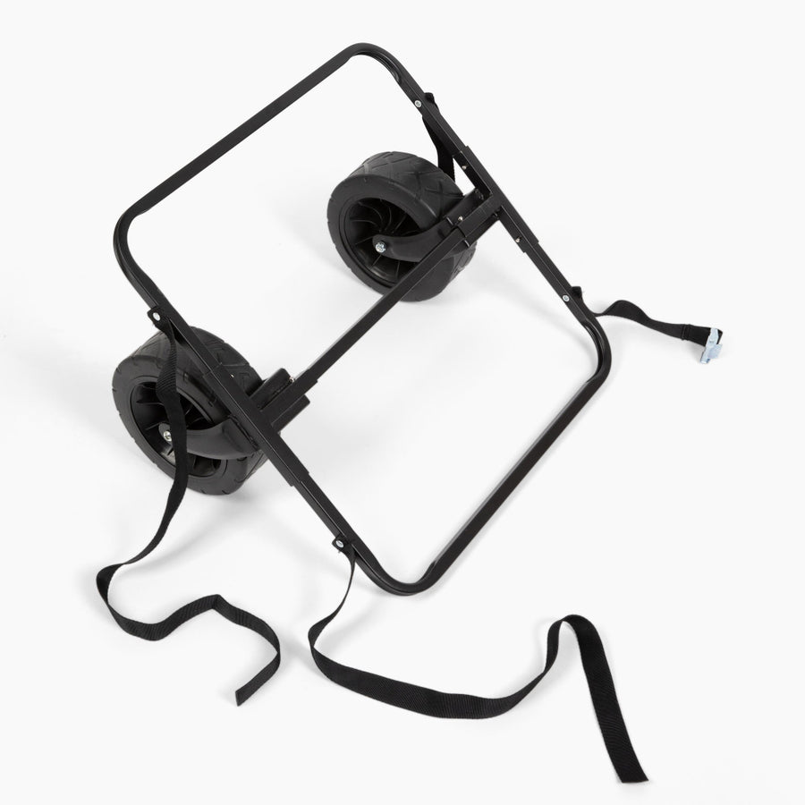 Black metal frame with wheels and straps on a white background