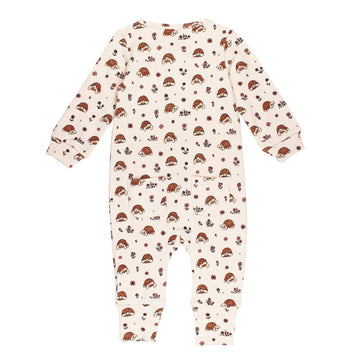Baby romper with tortoise pattern on a white background