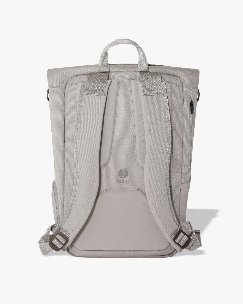 Picture of a back view of the taupe backpack against a white background