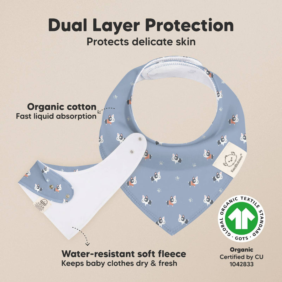 Baby bib with organic cotton and water-resistant fleece, featuring a GOTS certification logo.