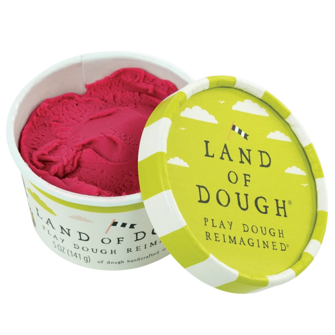 Picture of the dough cup with the dough mixed to a uniform strawberry color