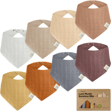 Set of Lumi Muslin Bandana Bibs in various colors with a packaging box in the corner.