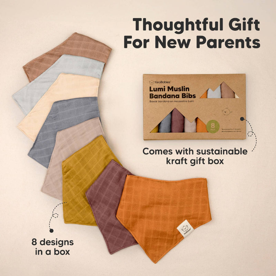 Set of Lumi Muslin Bandana Bibs with a sustainable kraft gift box on a beige background