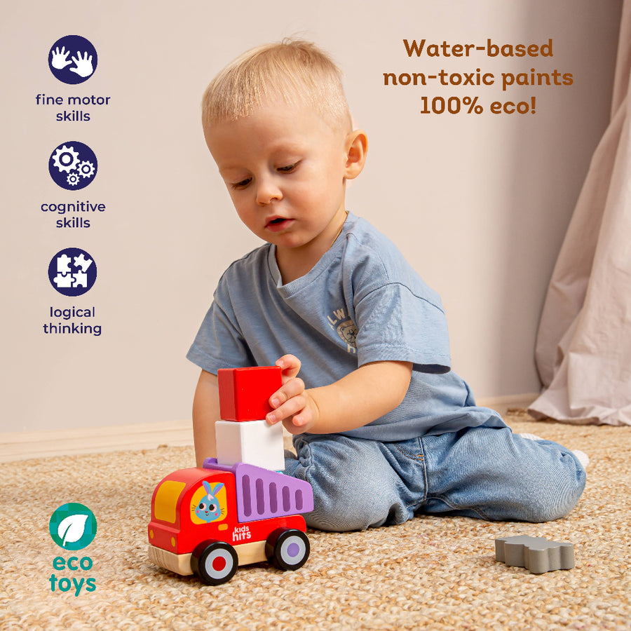 Child playing with a toy truck on a carpeted floor, with text about eco-friendly toys.
