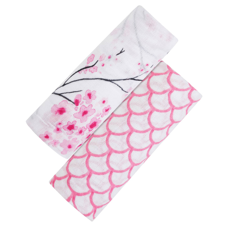 Two patterned swaddle blankets with cherry blossom design on a white background