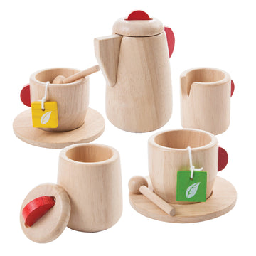 Wooden toy tea set with teapot, cups, and saucers on a white background
