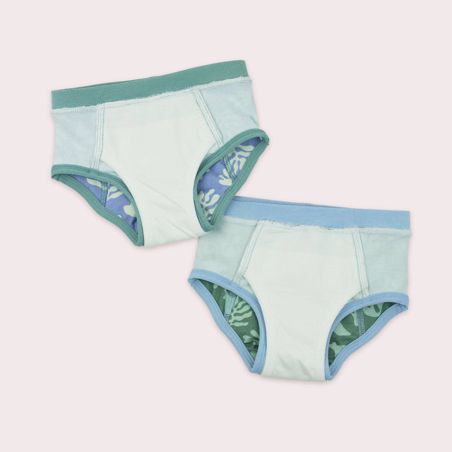 Two pairs of light blue underwear with green kelp patterns on a white background