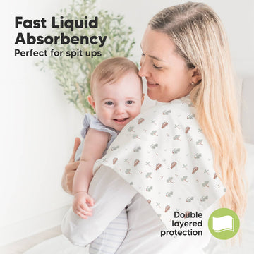 Woman holding a baby with text about fast liquid absorbency and double-layered protection.