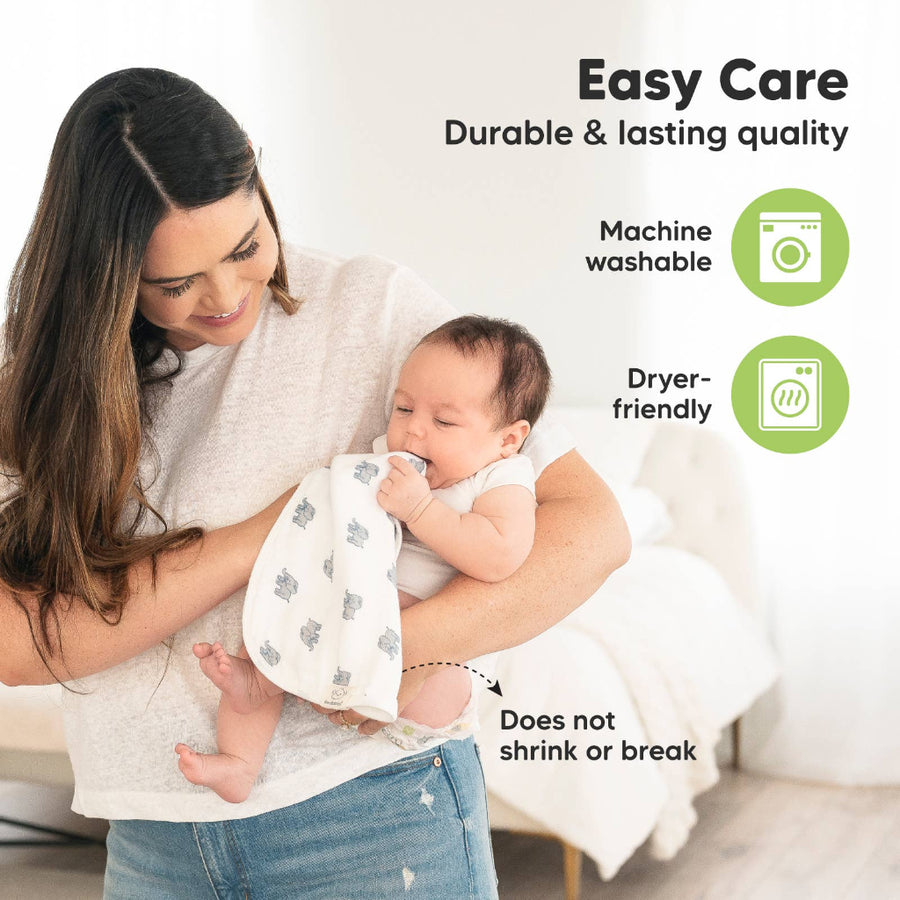 Woman holding a baby with a burp cloth with text about easy care and durability.