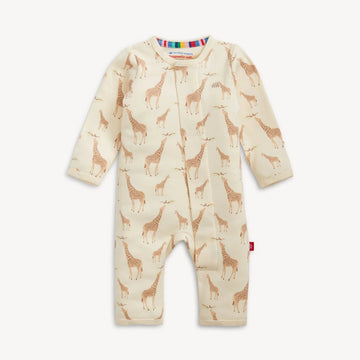 Baby onesie with giraffe pattern on a cream background