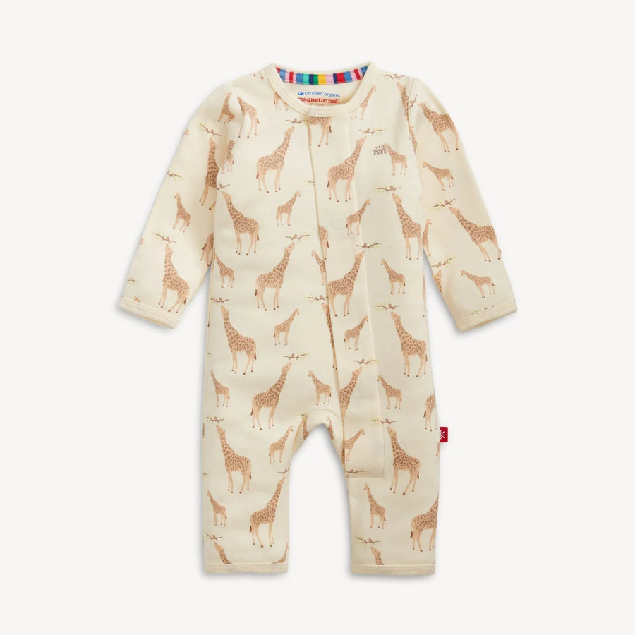 Baby onesie with giraffe pattern on a cream background