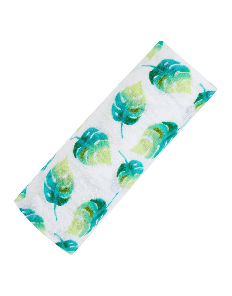 Swaddle blanket with green leaf pattern on a white background