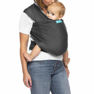 Picture of a woman wearing a dark grey Moby Evolution baby wrap with baby