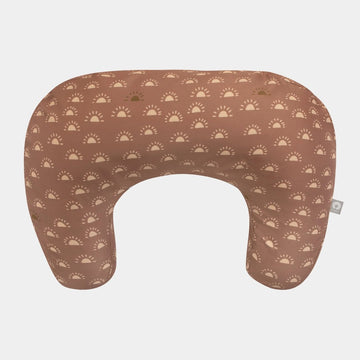 Boppy pillow with sun pattern on a light gray background