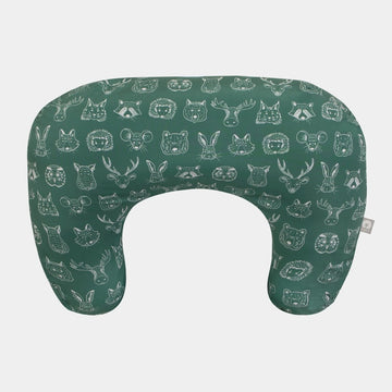 Green nursing pillow with animal pattern on a white background