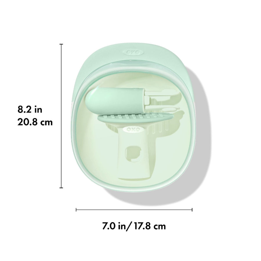 Top view of food masher with dimensions on a white background