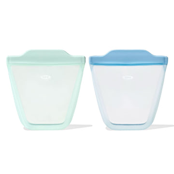 Two silicone food storage containers on a white background