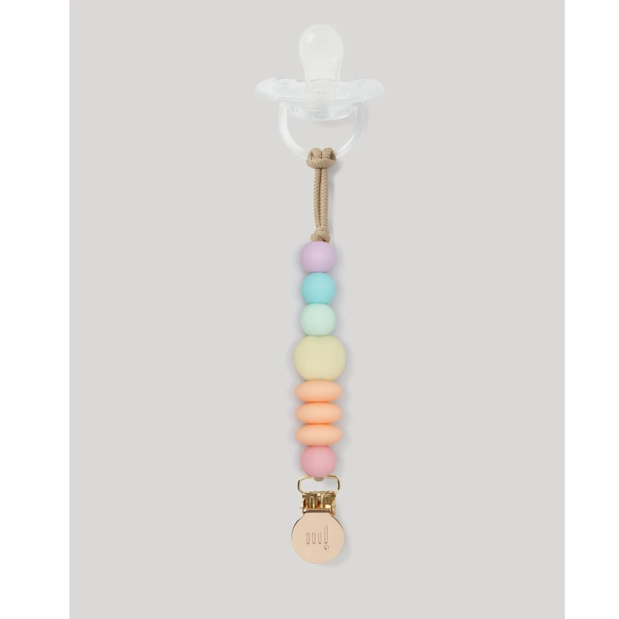 Picture of Rainbow Sherbet pacifier clip with clear silicone pacifier attached