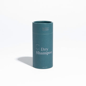Plastic-free package of Mother Mother dry shampoo in blue tube with silver label