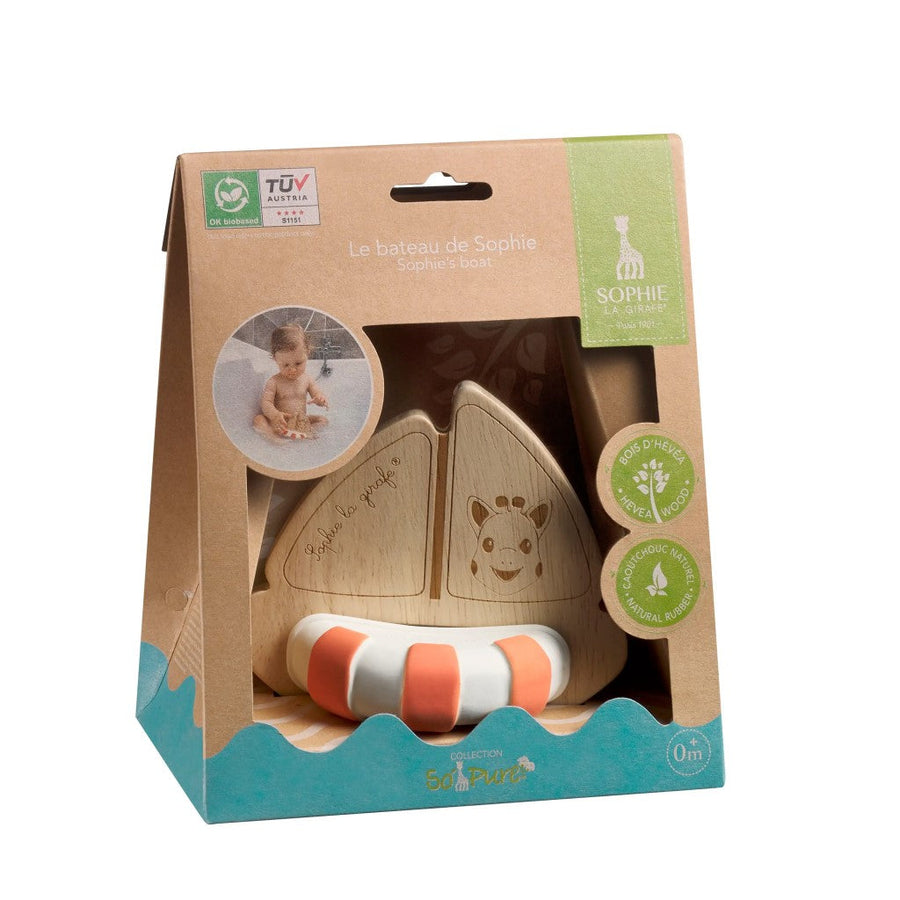Picture of Sophie La Girafe rubberwood boat toy in brown wedge shaped cardstock box